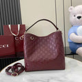 Gucci GG Emblem medium bucket bag ‎815103 in red leather