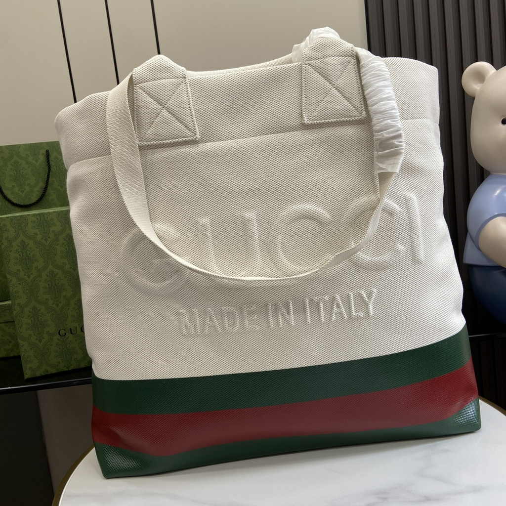 Gucci canvas tote bag with embossed detail 779510 in natural canvas