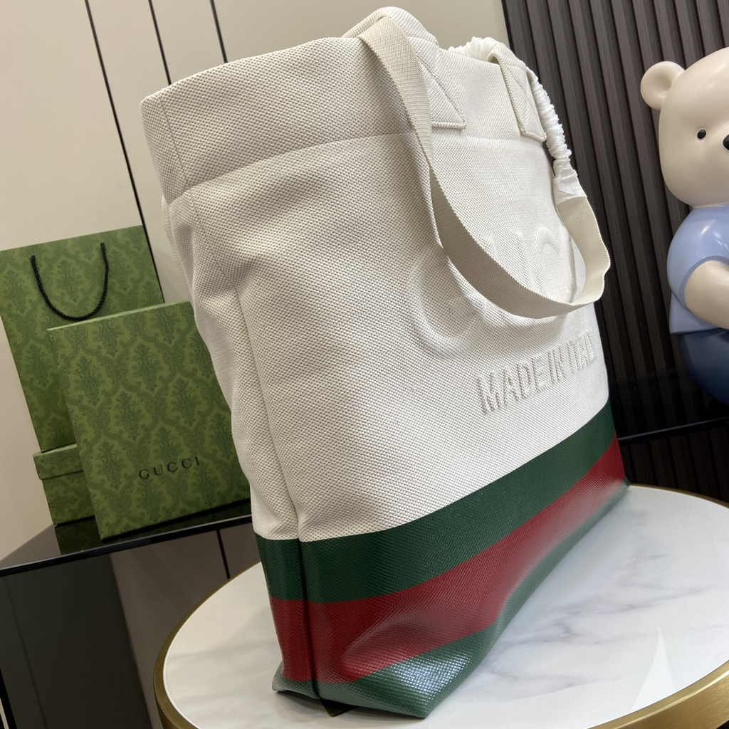 Gucci canvas tote bag with embossed detail 779510 in natural canvas