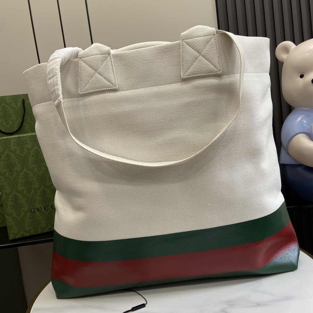 Gucci canvas tote bag with embossed detail 779510 in natural canvas