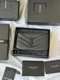 Saint Laurent quilted leather key pouch with zip-around closure and silver Cassandre logo