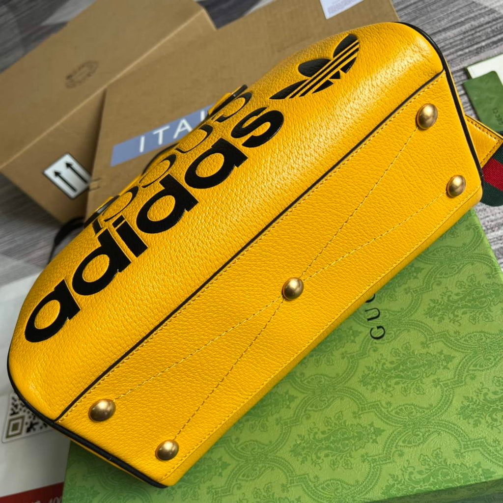adidas x Gucci 702397 mini duffle bag yellow