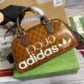 adidas x Gucci 702397 mini duffle bag brown