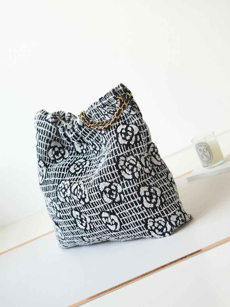 Chanel 22 Handbag AS3261 Cashmere Jacquard Black White