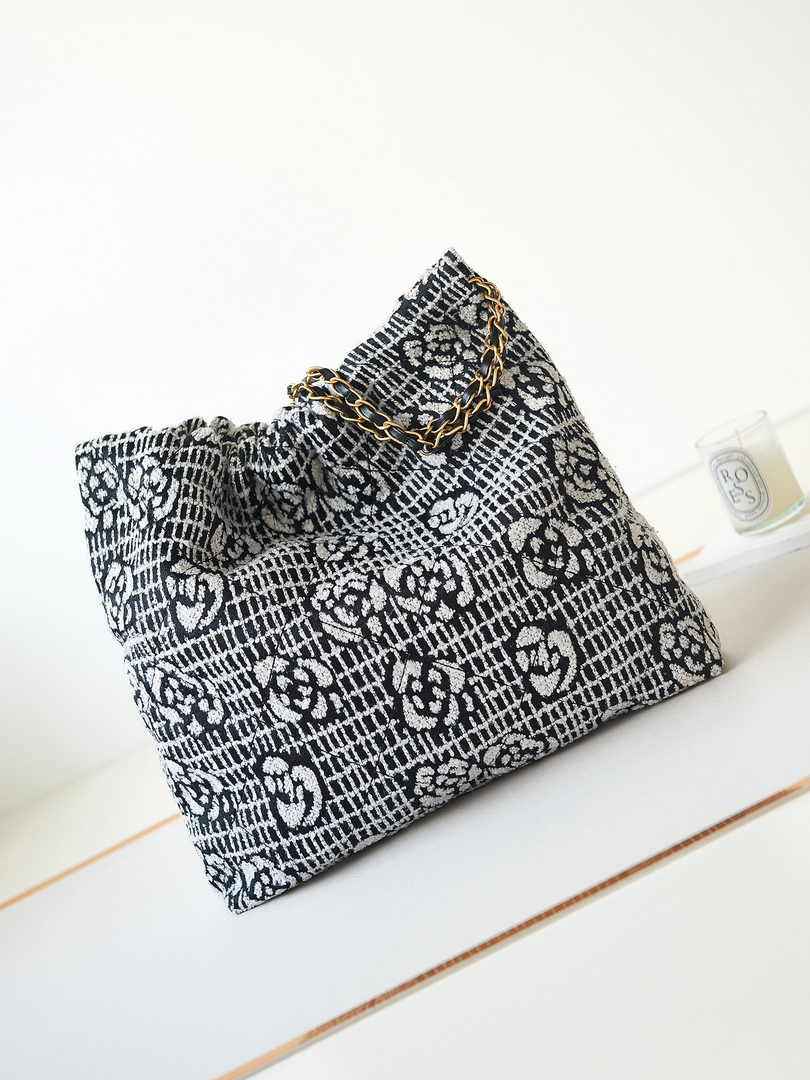 Chanel 22 Handbag AS3261 Cashmere Jacquard Black White
