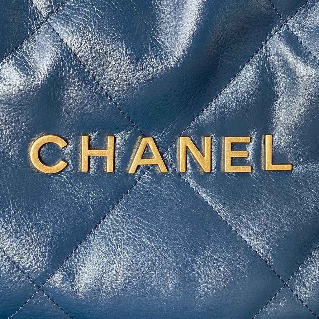 Chanel 22 Handbag AS3261 Shiny Calfskin Gold-Tone Metal Navy Blue