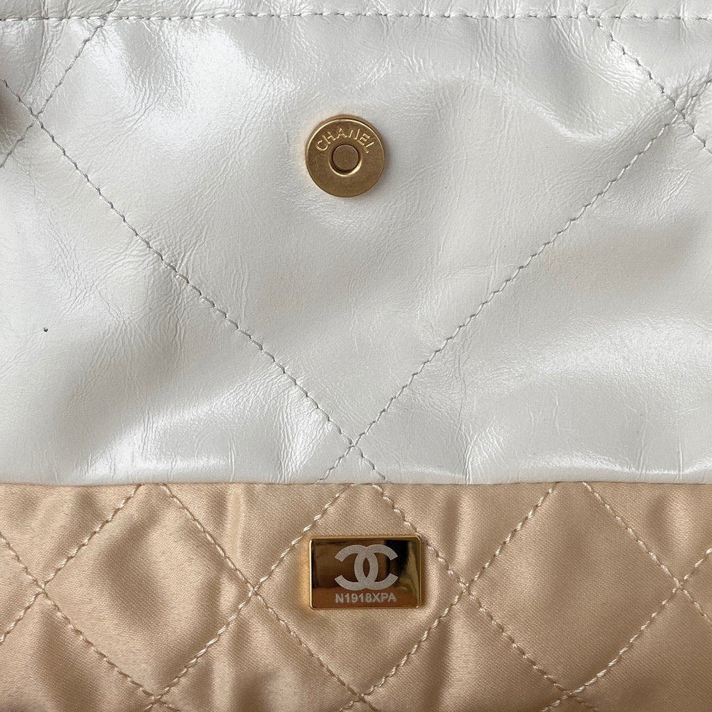 Chanel 22 Handbag AS3261 Shiny Calfskin Gold-Tone Metal White Logo Black