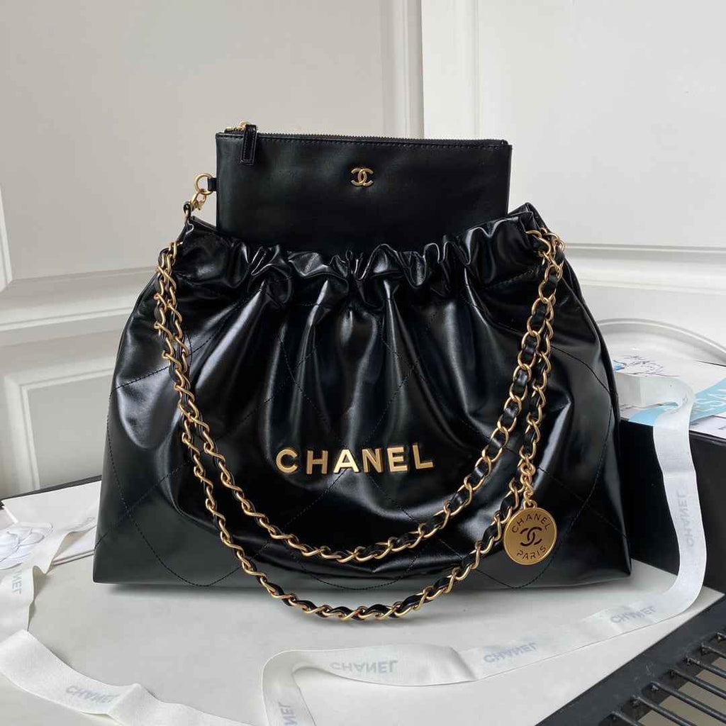 Chanel 22 Handbag AS4486 Calfskin In Black Gold
