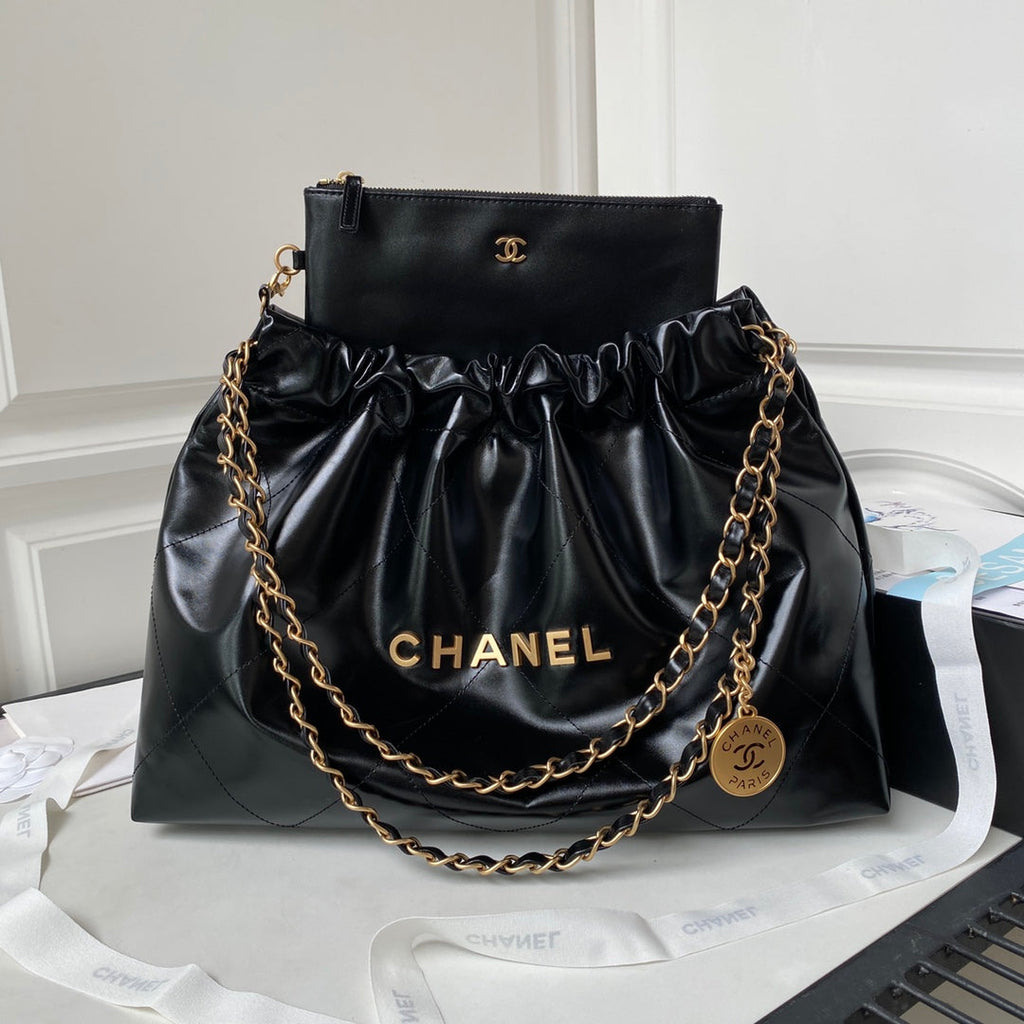 Chanel 22 Handbag AS4486 Calfskin In Black Gold