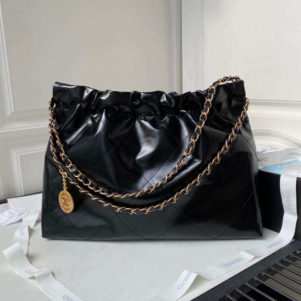Chanel 22 Handbag AS4486 Calfskin In Black Gold