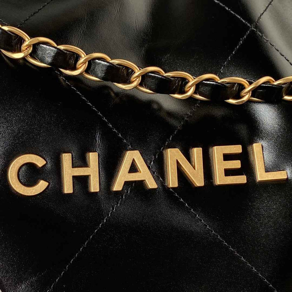 Chanel 22 Handbag AS4486 Calfskin In Black Gold