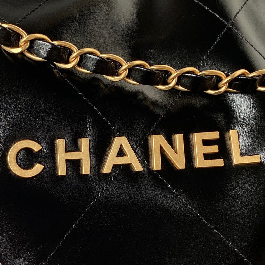 Chanel 22 Handbag AS4486 Calfskin In Black Gold