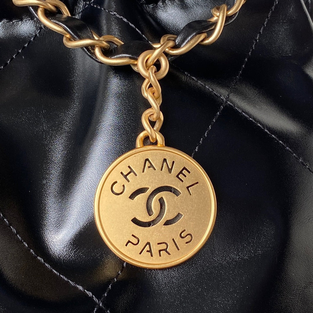Chanel 22 Handbag AS4486 Calfskin In Black Gold