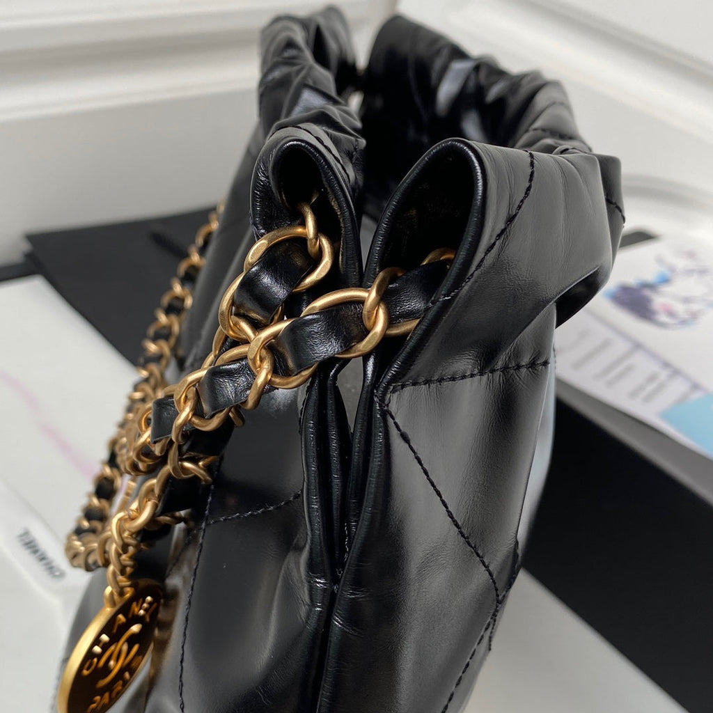 Chanel 22 Handbag AS4486 Calfskin In Black Gold