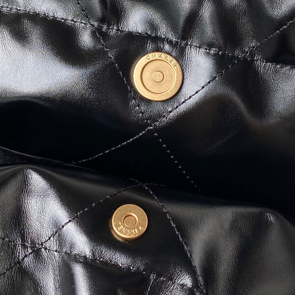 Chanel 22 Handbag AS4486 Calfskin In Black Gold