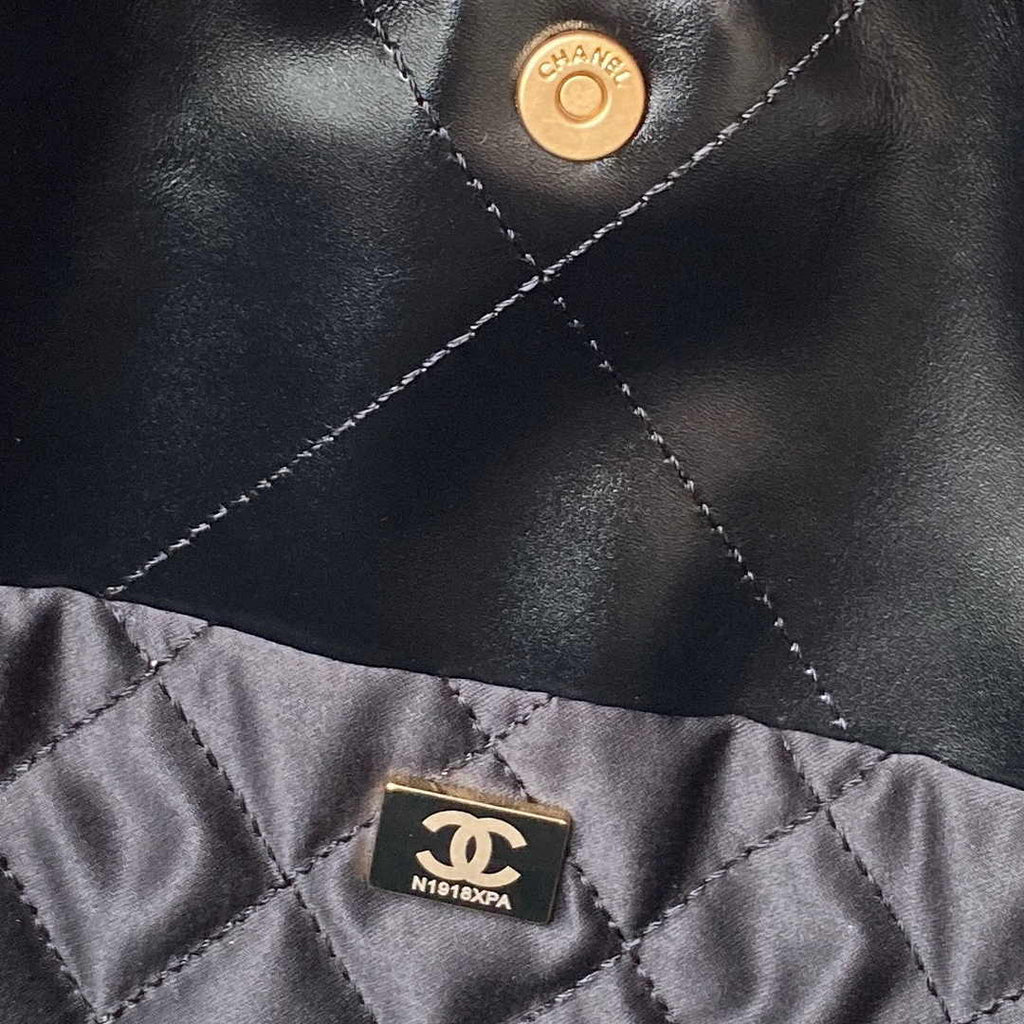 Chanel 22 Handbag AS4486 Calfskin In Black Gold