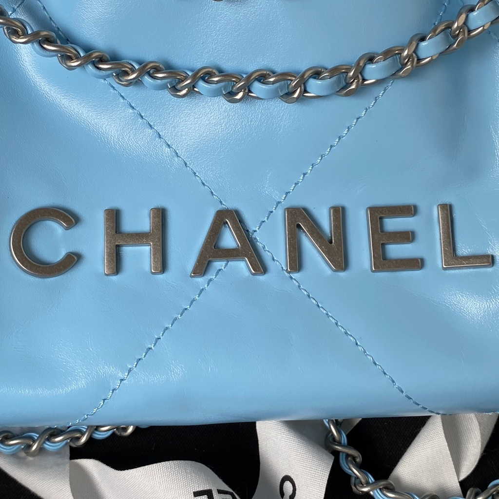 Chanel 22 Mini Handbag AS3980 Shiny Calfskin Silver-Tone Metal Light Blue
