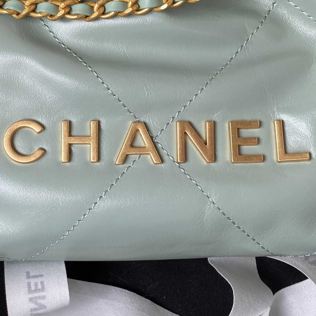 Chanel 22 Mini Handbag AS3980 Shiny Calfskin Gold-Tone Metal Gray