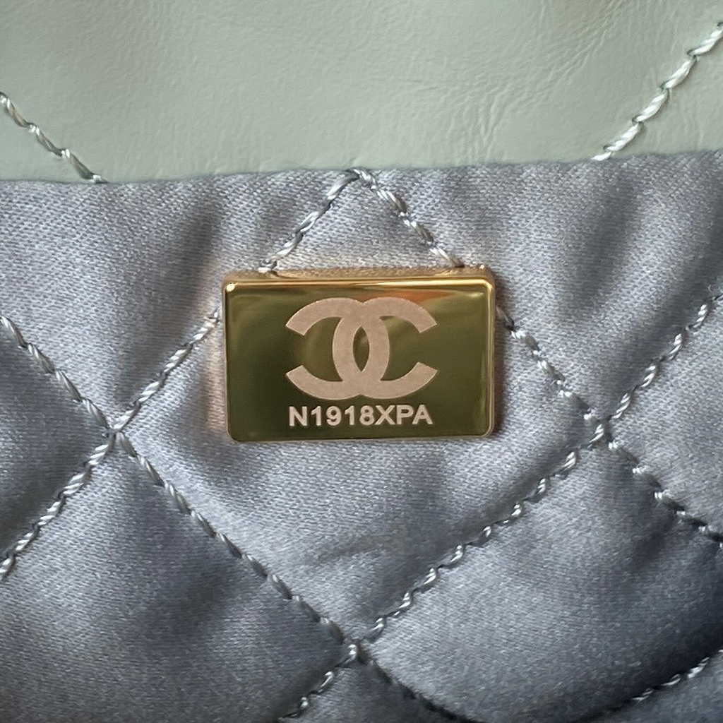 Chanel 22 Mini Handbag AS3980 Shiny Calfskin Gold-Tone Metal Gray