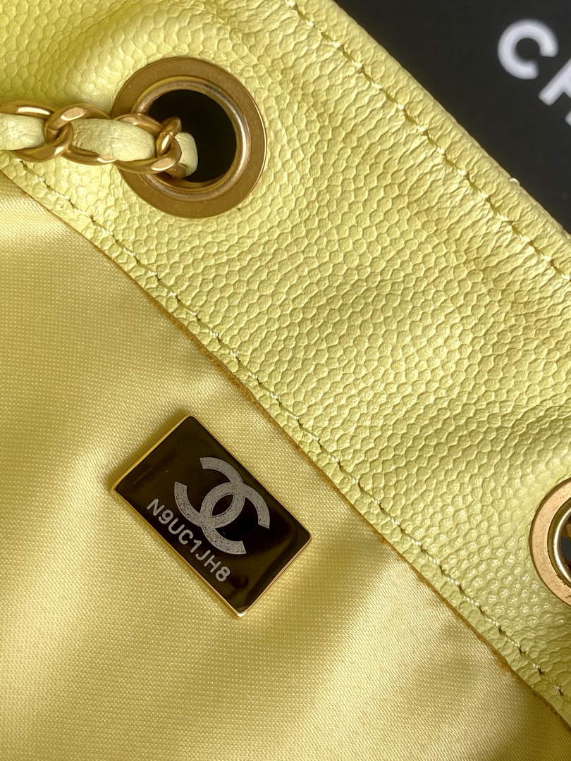 Chanel 25 medium handbag, AS5311 grained calfskin yellow