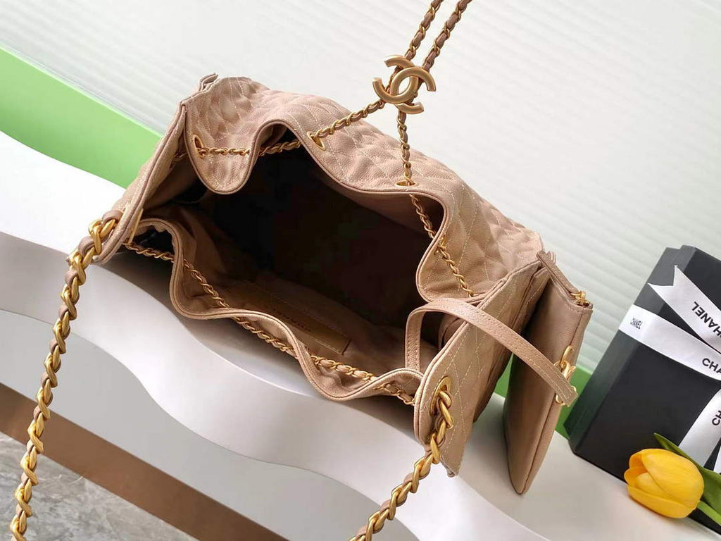 Chanel 25 medium handbag, AS5311 grained calfskin brown