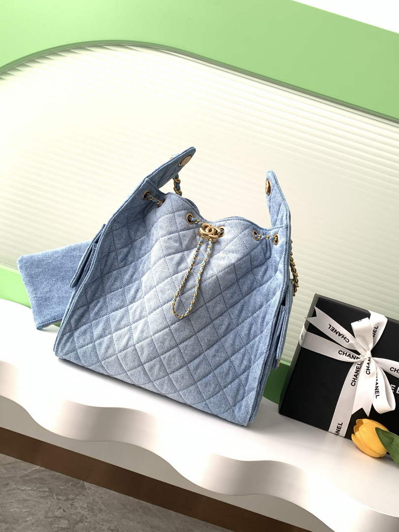 Chanel 25 medium handbag, AS5311 washed denim blue