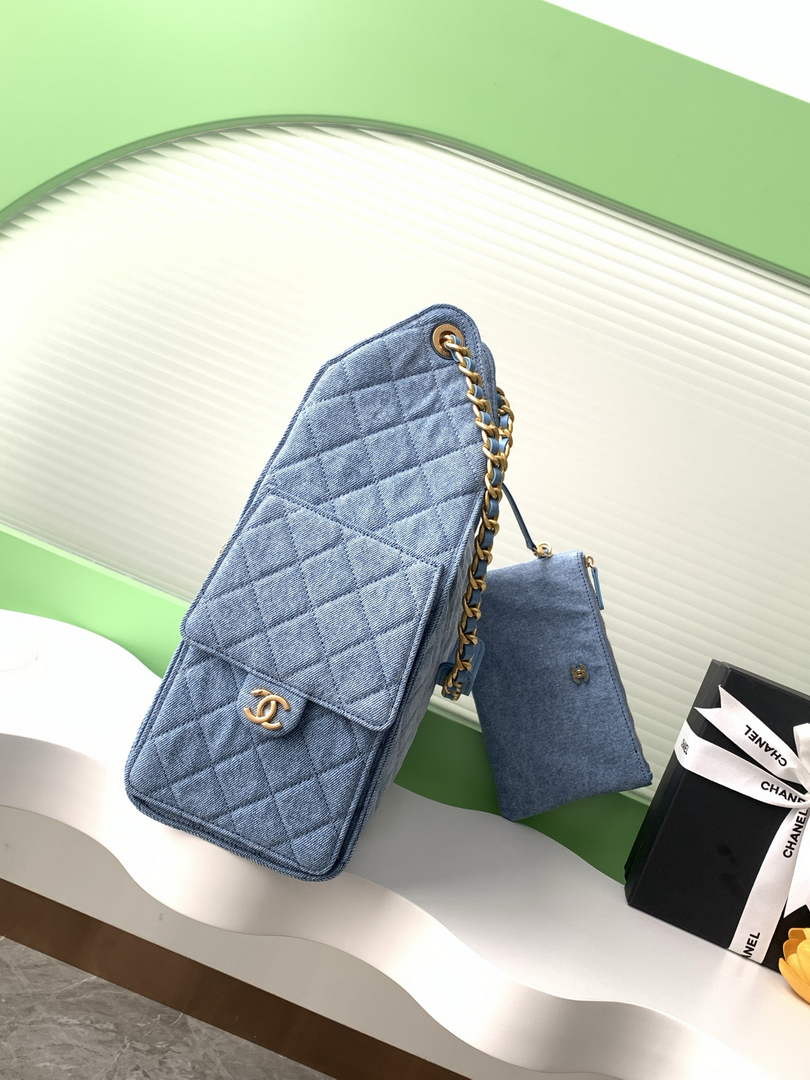 Chanel 25 medium handbag, AS5311 washed denim blue
