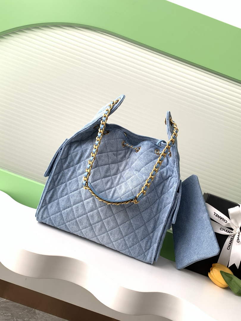 Chanel 25 medium handbag, AS5311 washed denim blue