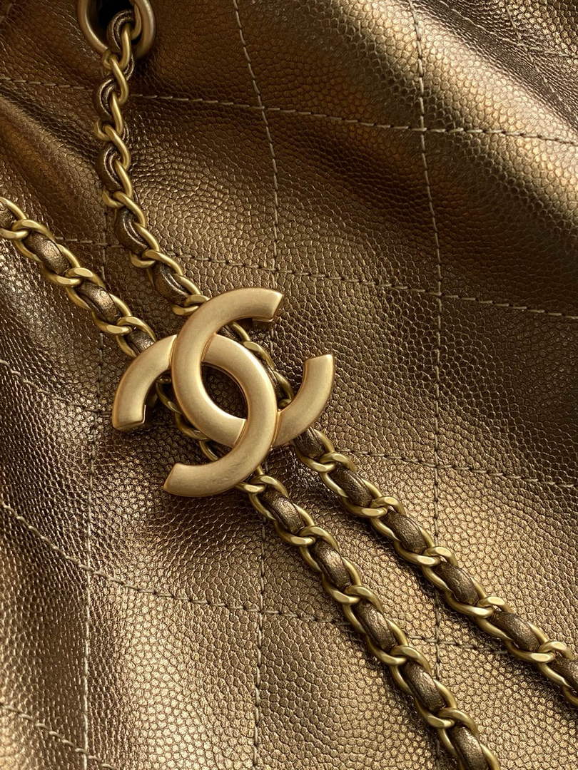 Chanel 25 medium handbag, AS5311 grained calfskin bronze