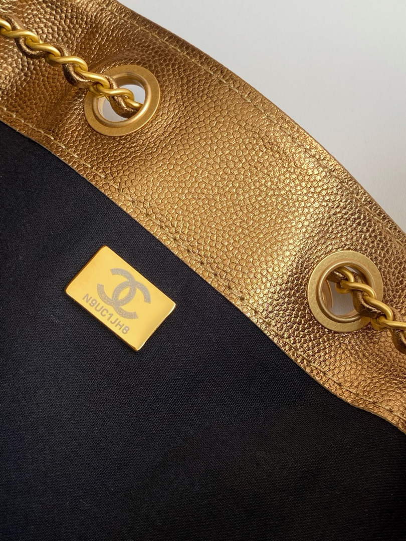 Chanel 25 medium handbag, AS5311 grained calfskin bronze
