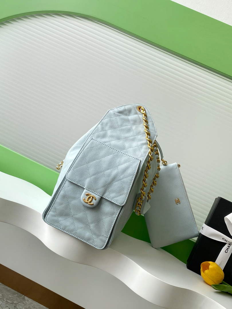 Chanel 25 medium handbag, AS5311 grained calfskin blue