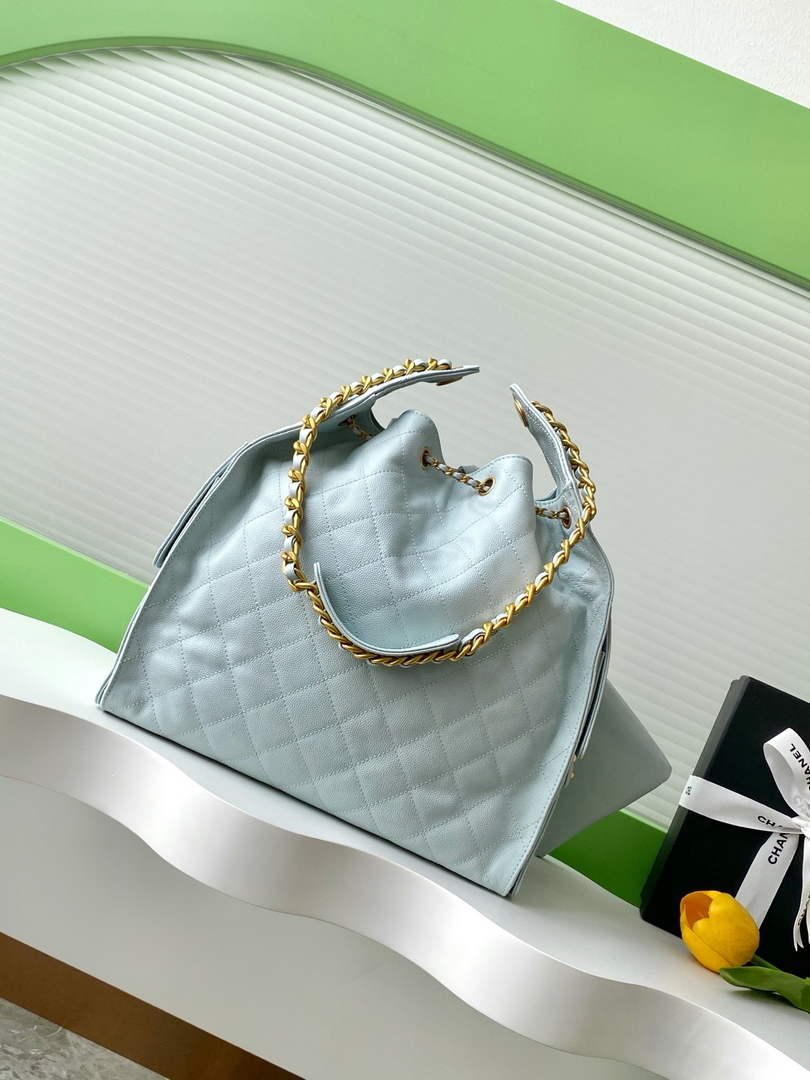 Chanel 25 medium handbag, AS5311 grained calfskin blue