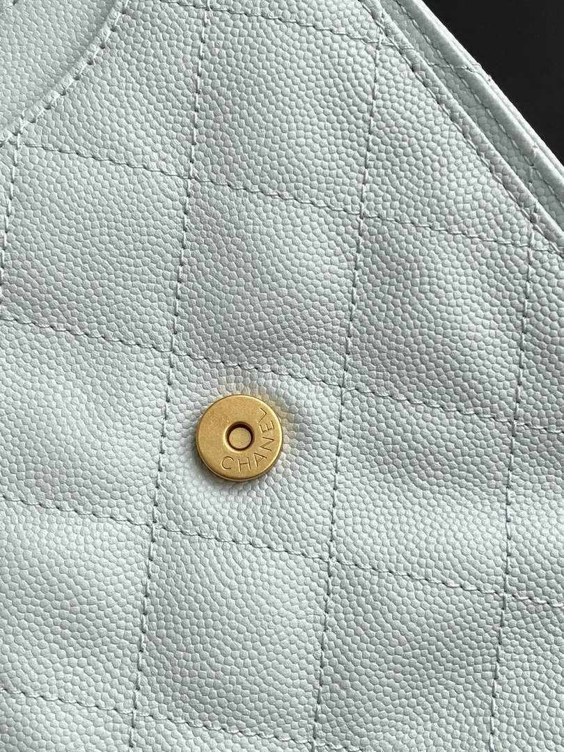 Chanel 25 medium handbag, AS5311 grained calfskin blue