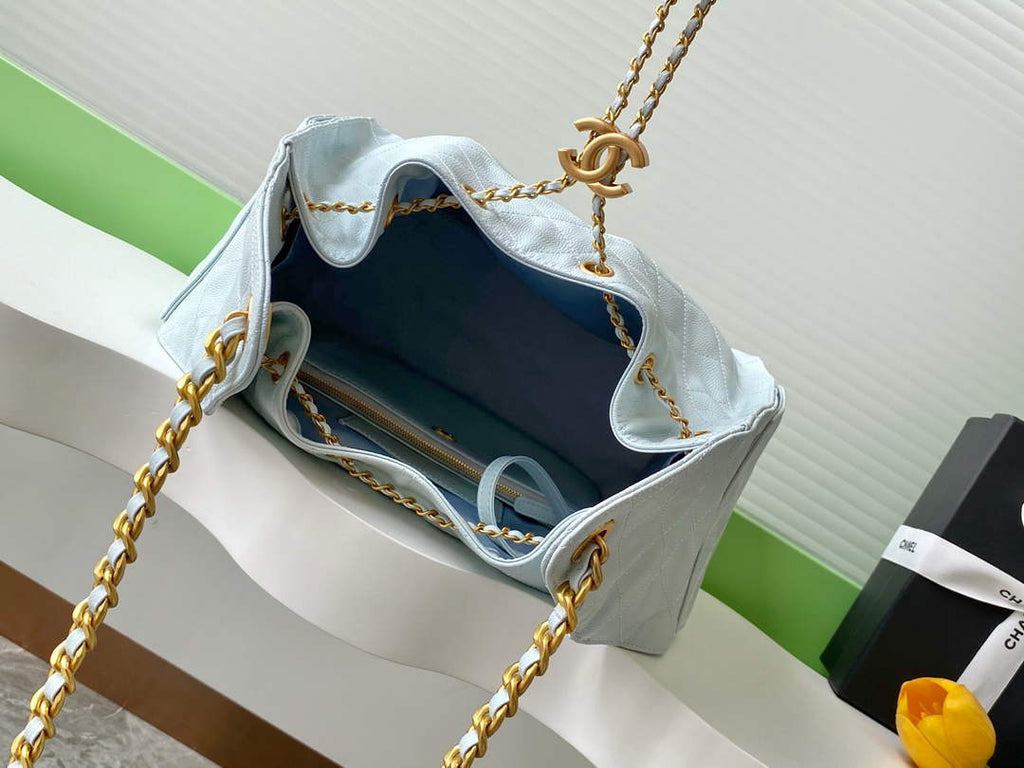 Chanel 25 medium handbag, AS5311 grained calfskin blue
