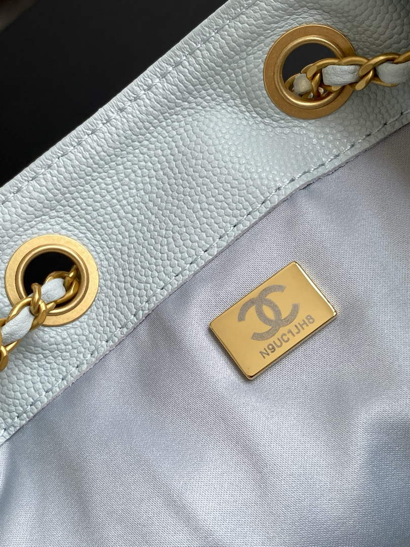 Chanel 25 medium handbag, AS5311 grained calfskin blue