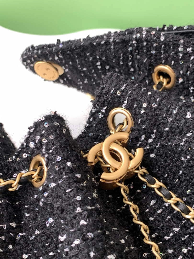 Chanel 25 small handbag, AS5293 Tweed Black