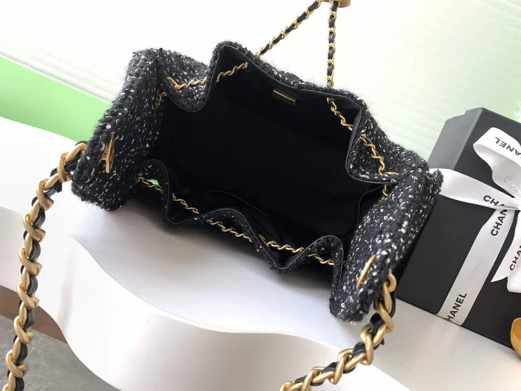 Chanel 25 small handbag, AS5293 Tweed Black