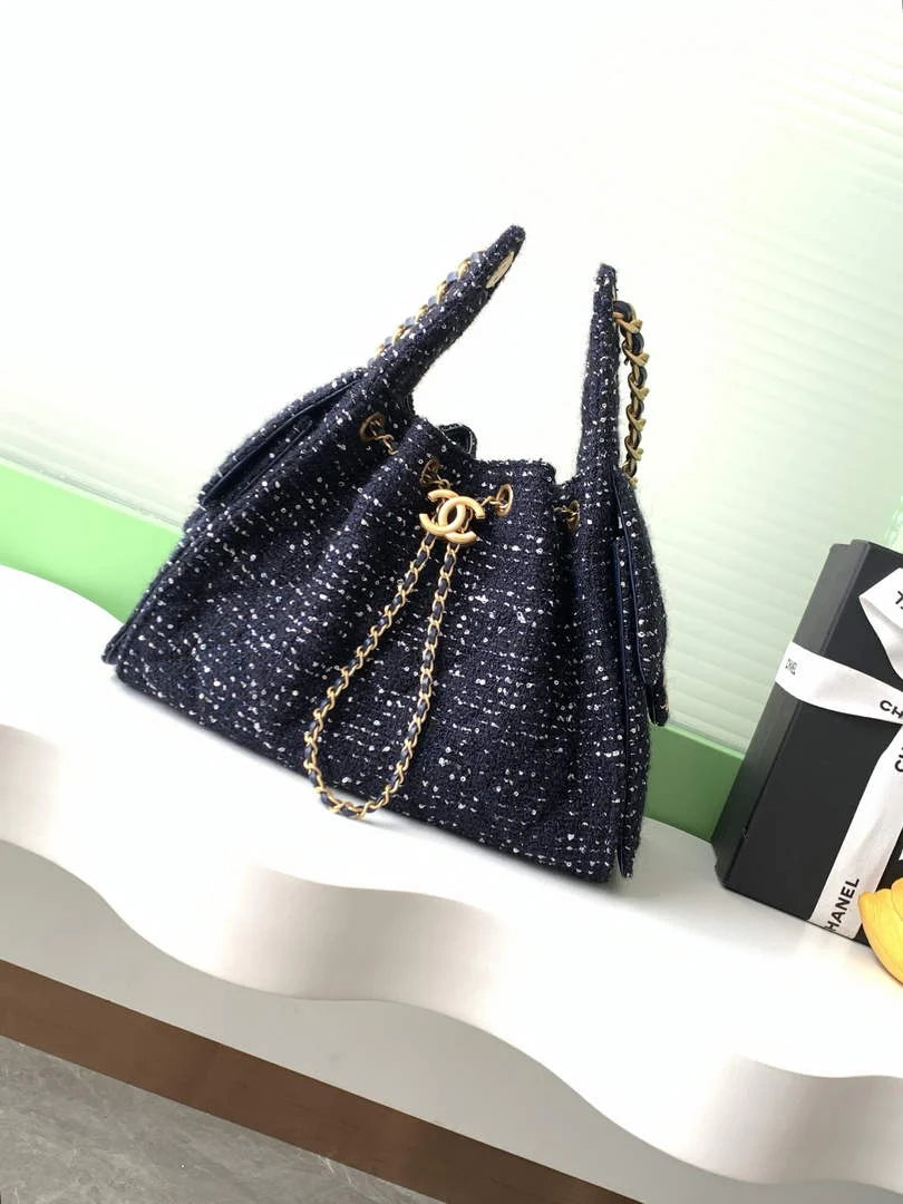 Chanel 25 small handbag, AS5293 Tweed Navy