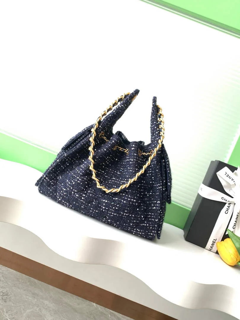Chanel 25 small handbag, AS5293 Tweed Navy