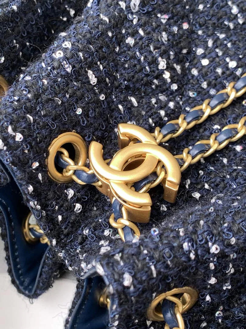 Chanel 25 small handbag, AS5293 Tweed Navy