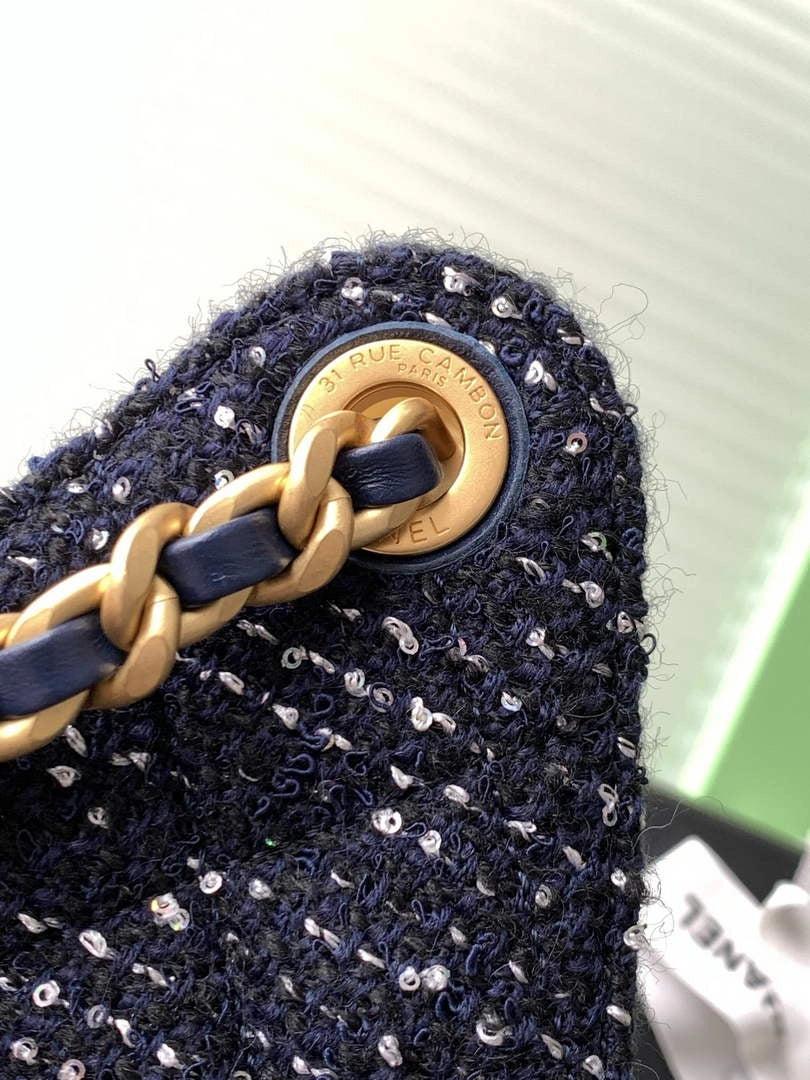 Chanel 25 small handbag, AS5293 Tweed Navy