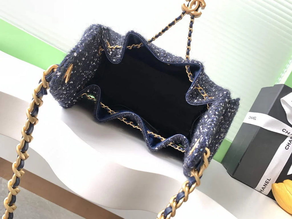 Chanel 25 small handbag, AS5293 Tweed Navy