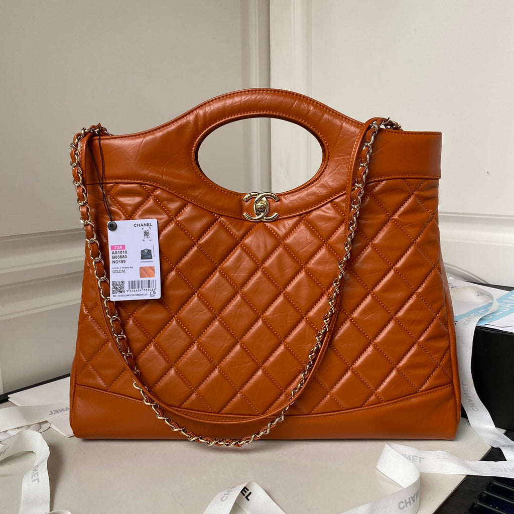 Chanel 31 Large shopping bag AS1010 Shiny Calfskin Brown