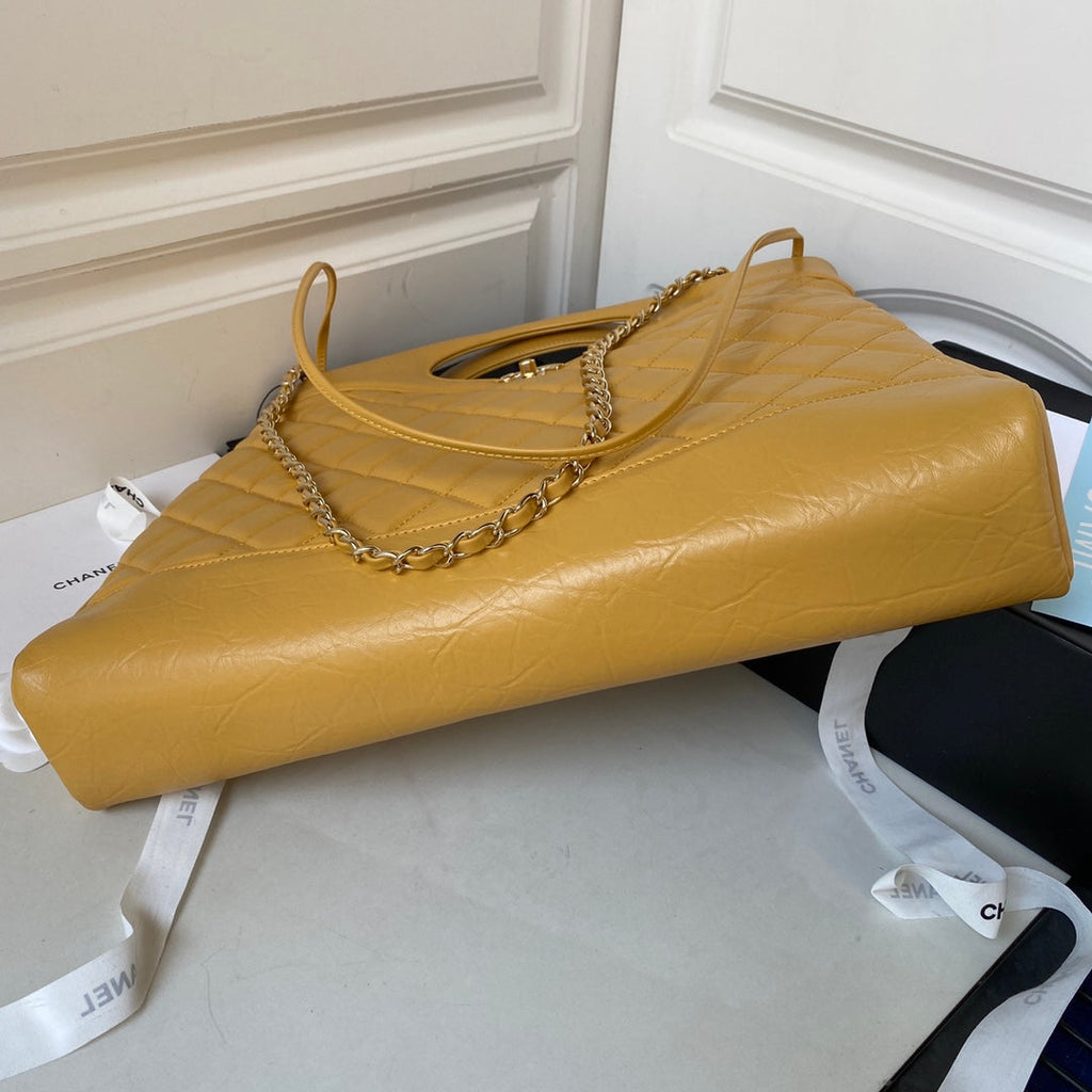 Chanel 31 Large shopping bag AS1010 Shiny Calfskin Yellow