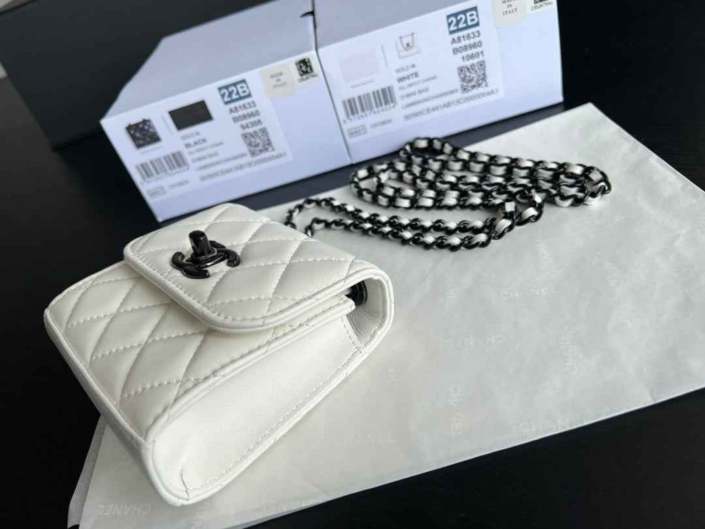 Chanel A81633 Clutch with Chain Lambskin black white