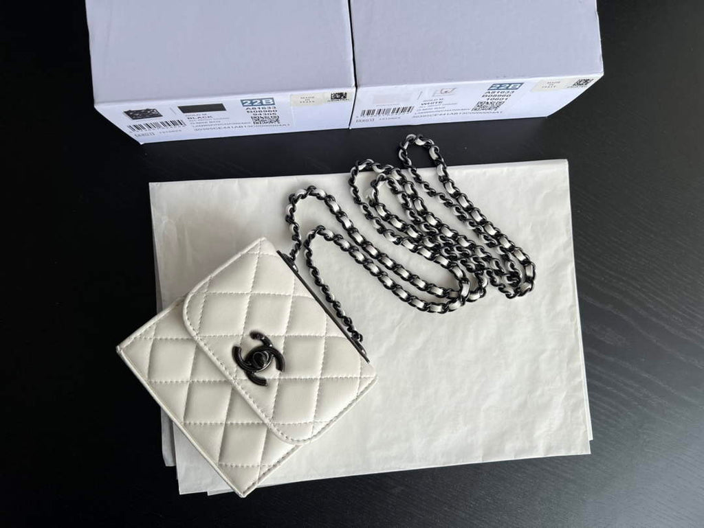 Chanel A81633 Clutch with Chain Lambskin black white