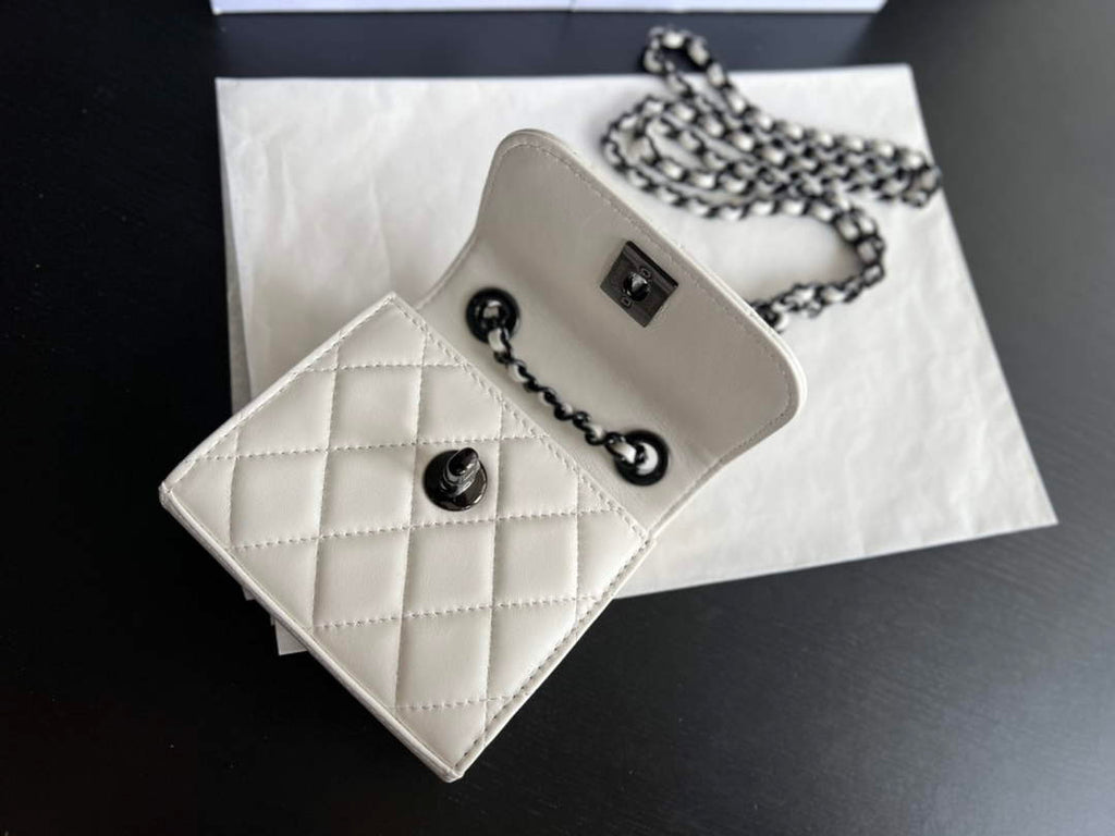 Chanel A81633 Clutch with Chain Lambskin black white