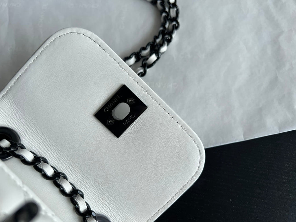 Chanel A81633 Clutch with Chain Lambskin black white