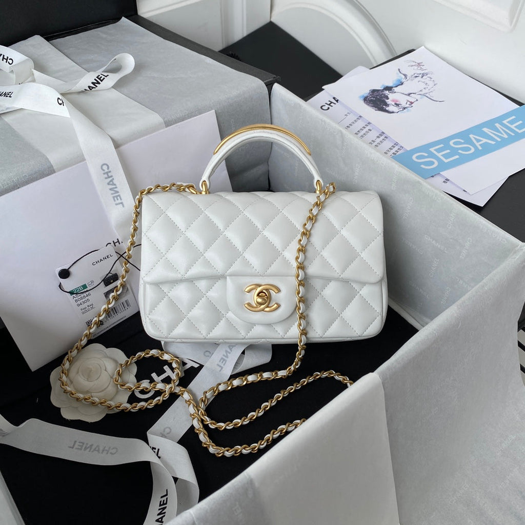 Chanel AS2431 mini flap bag with top handle lambskin leather white