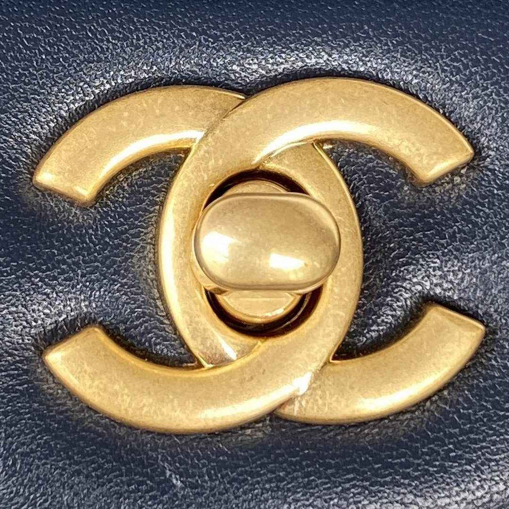 Chanel AS2431 mini flap bag with top handle lambskin leather navy blue